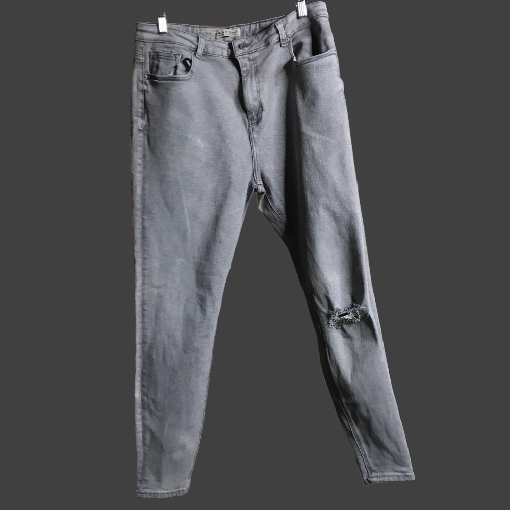 Denim & Co. high rise stretch ankle jeans. Gray with distressing on the …